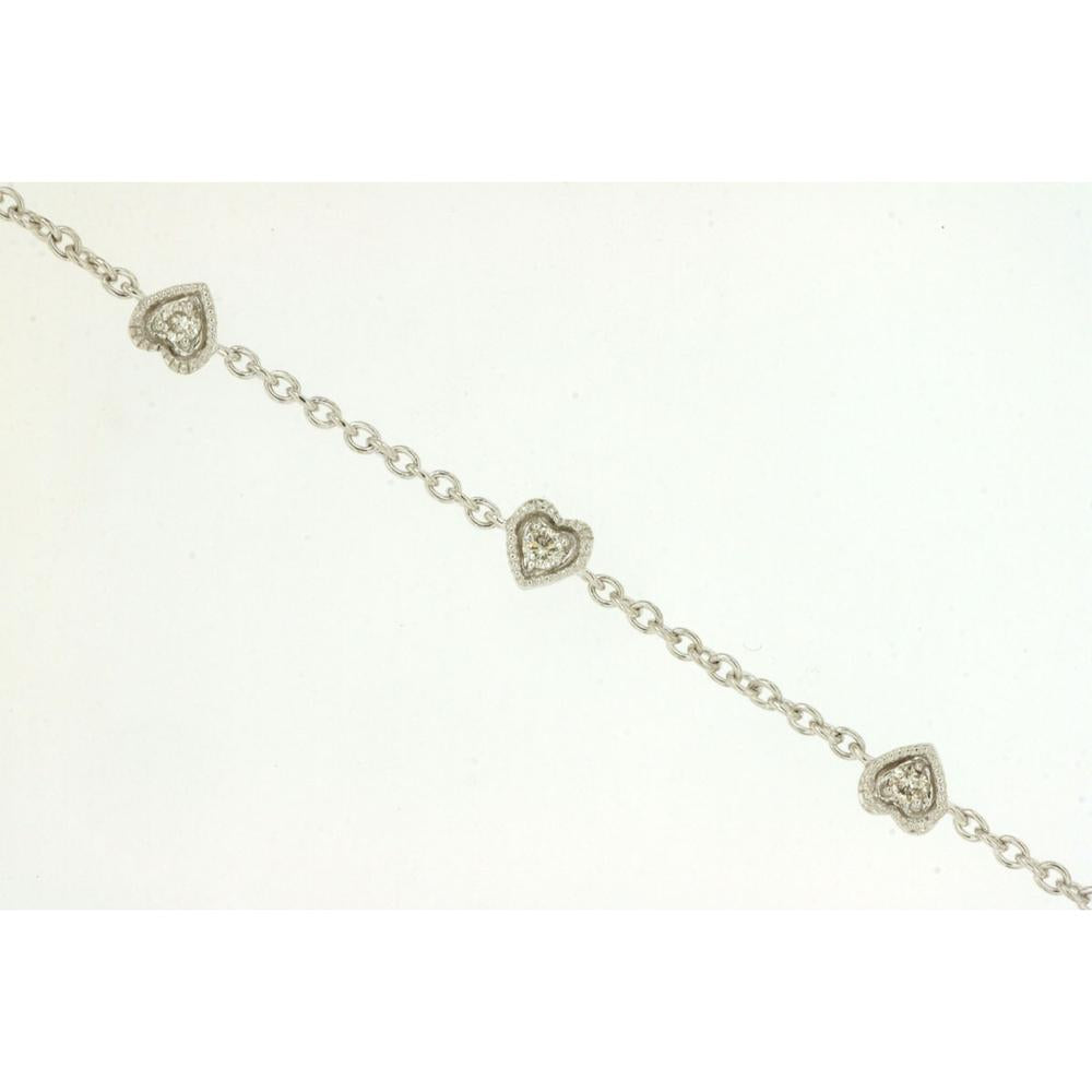 Royal 14K White Gold Station Bracelet with Heart-Shaped Diamond Motifs - 0.15 Carat Total Diamond Weight