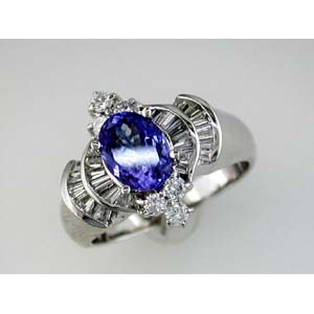 Royal 14K White Gold Tanzanite and Diamond Halo Ring - 1.30 Carat Oval Tanzanite - 0.75 Carat Total Diamond Weight
