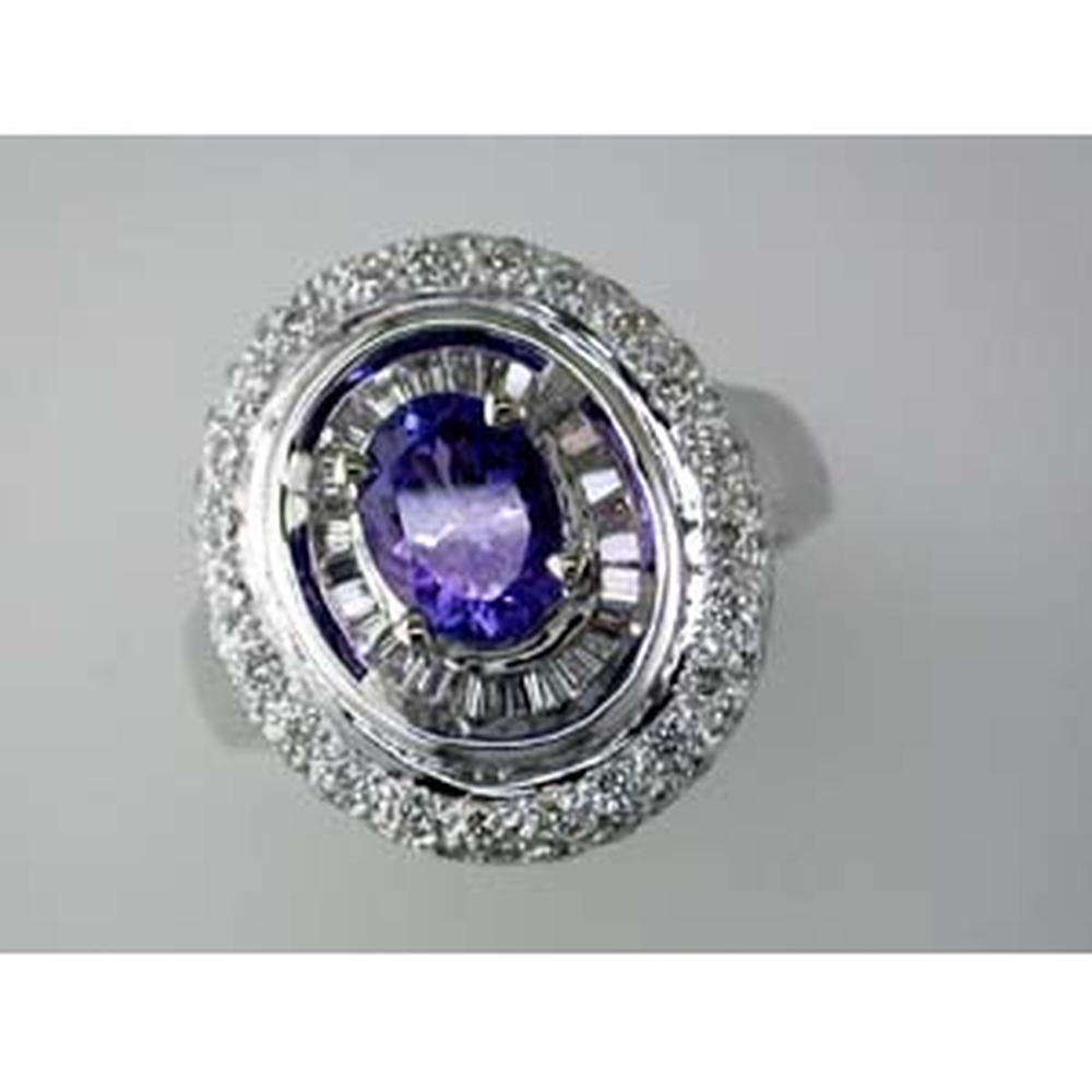 Royal 14K White Gold Tanzanite & Diamond Ring - 1.25 Carat Oval Tanzanite - 1.30 Carat Total Diamond Weight