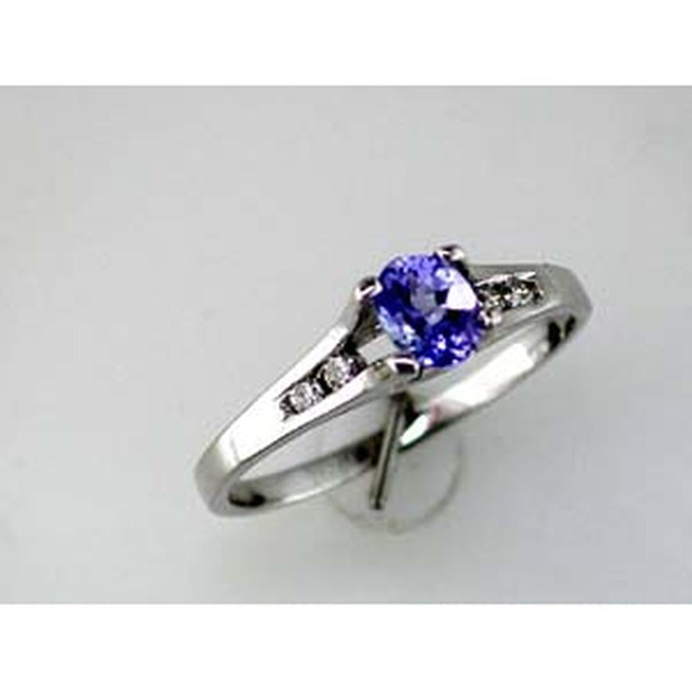 Royal 14K White Gold Tanzanite Halo Ring - 0.38 Carat Oval Tanzanite & 0.09 Carat Round Diamond Total Weight