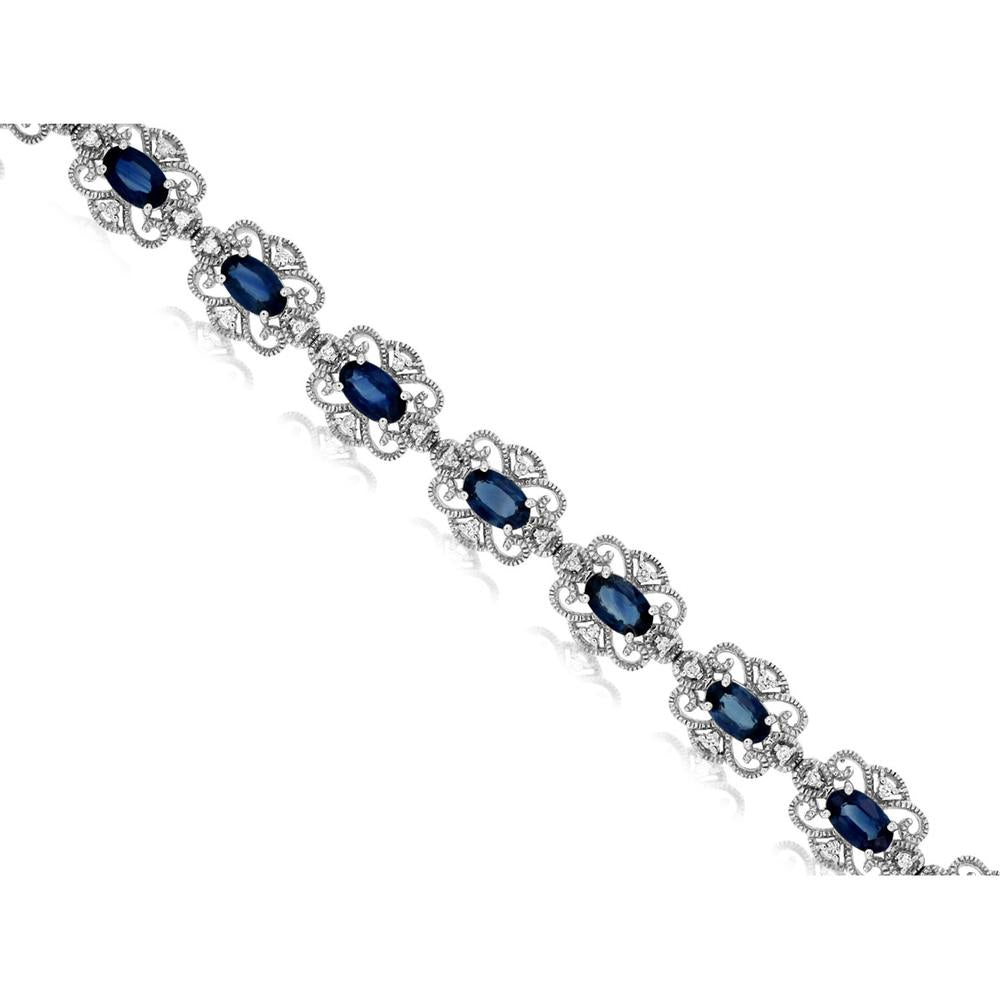 Royal 14K White Gold Tennis Bracelet with Oval Sapphires and Prong-Set Diamonds - 4.80 Carat Sapphire, 0.27 Carat Diamond