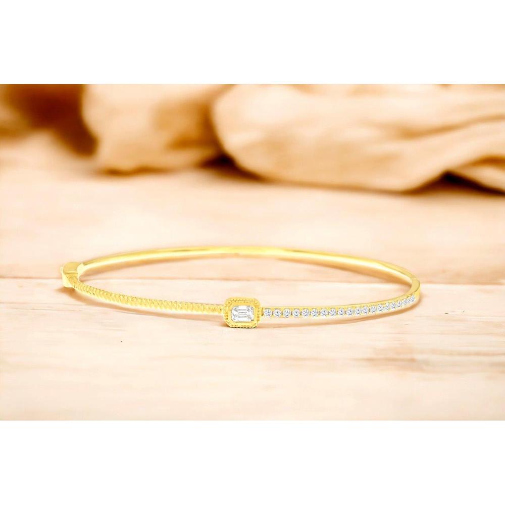 Royal 14K Yellow Gold Bangle with Baguette Diamond Center and Round Diamond Accents - 0.56 Carat Total Diamond Weight