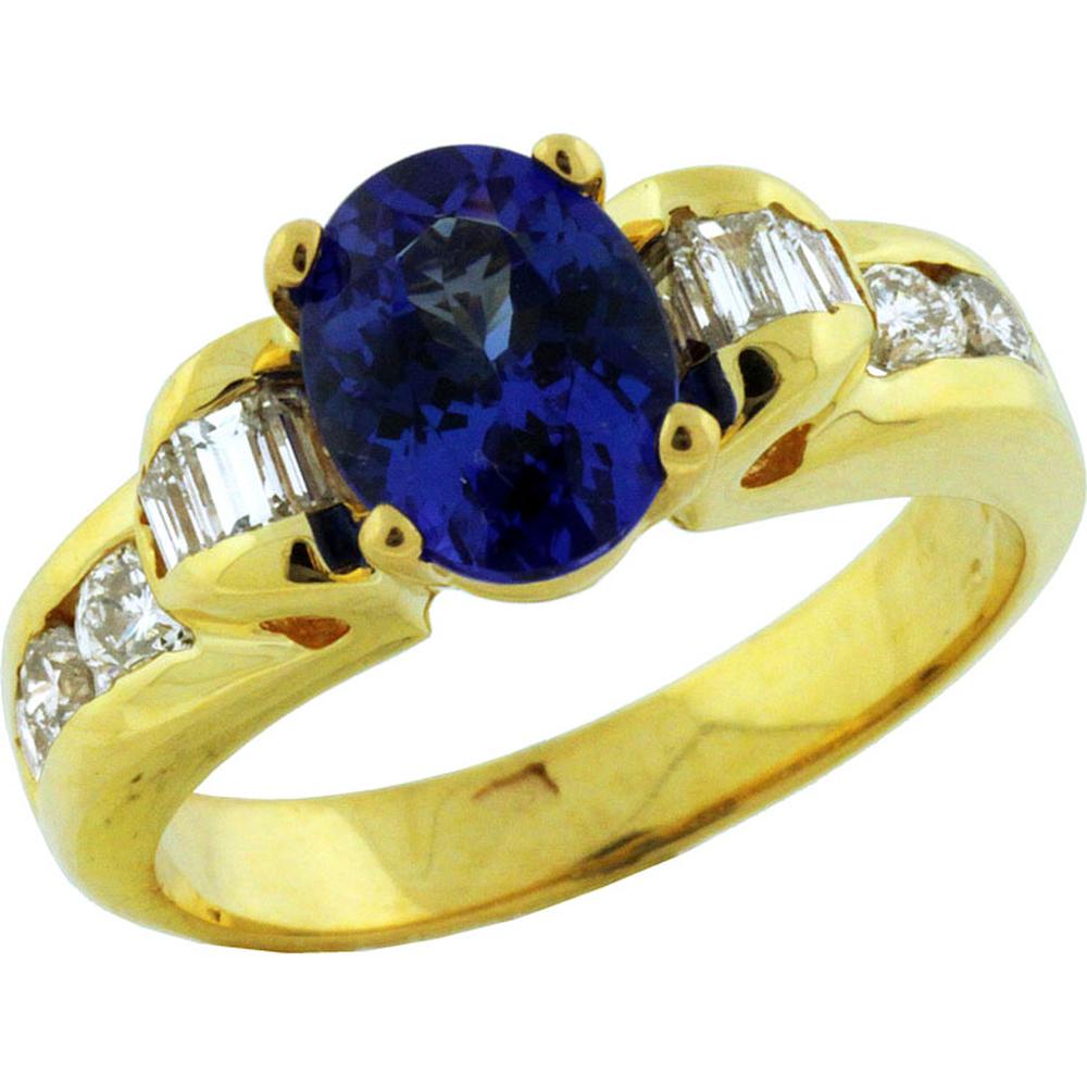 Royal 14K Yellow Gold Oval Tanzanite and Diamond Ring with Baguette and Round Diamonds - 2.10 Carats Tanzanite, 0.90 Carats Total Diamond Weight