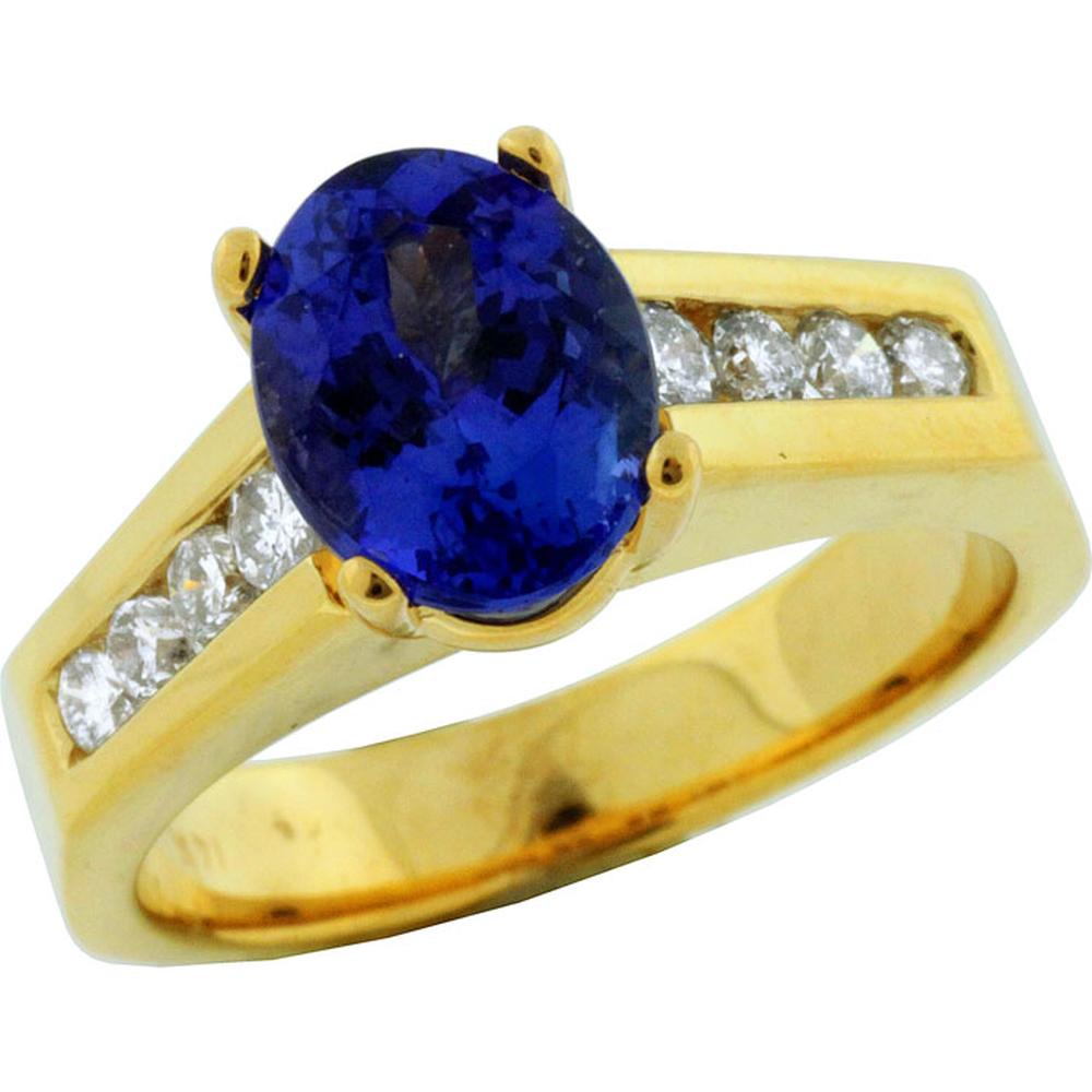 Royal 14K Yellow Gold Ring with Oval Tanzanite - 2.15 Carat and Channel Set Round Diamonds - 0.44 Carat Total Diamond Weight