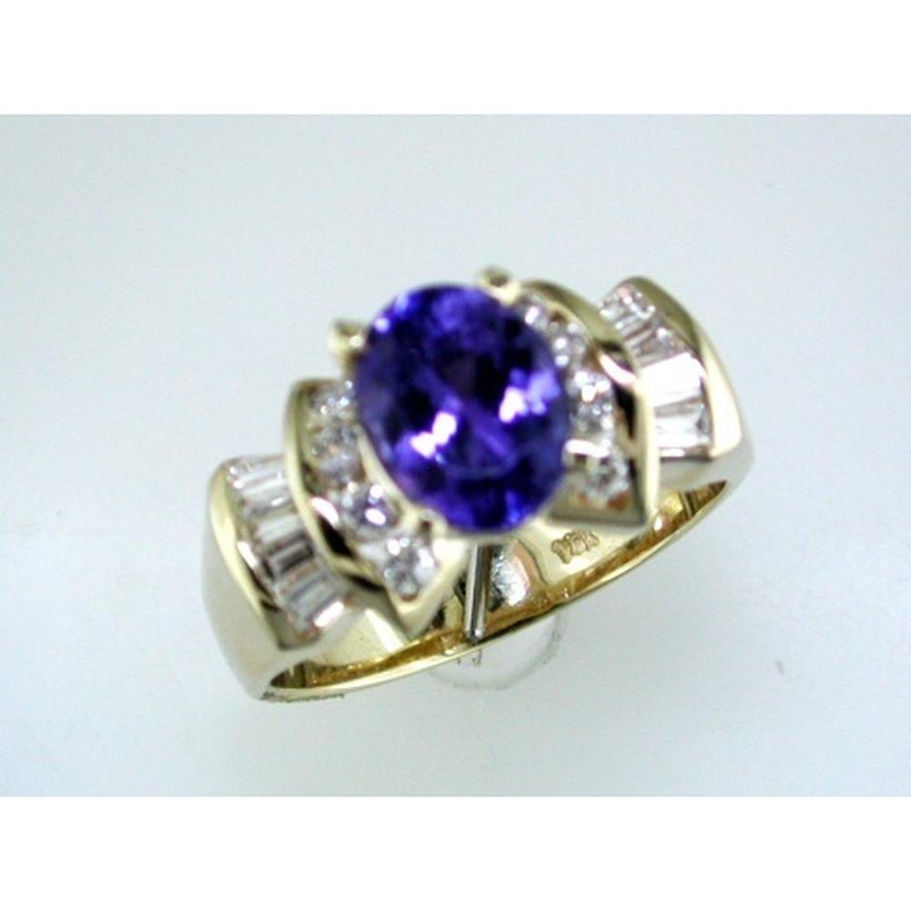 Royal 14K Yellow Gold Tanzanite & Diamond Ring - 2.30 Carat Oval Tanzanite - 0.77 Carat Total Diamond Weight