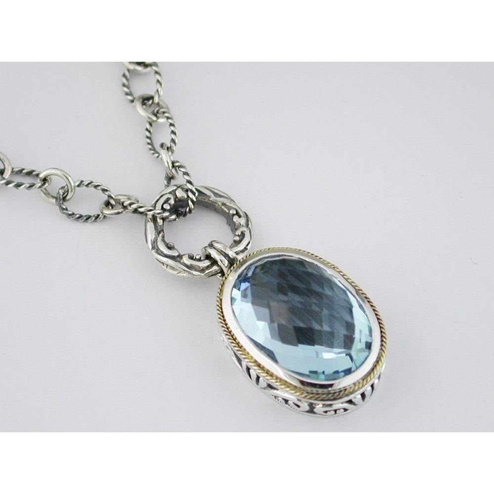 Royal Blue Topaz Pendant with Silver and Gold Accent