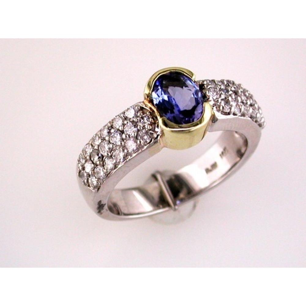 Royal Elegant 14K White Gold Tanzanite and Diamond Ring - 0.80 Carat Oval Tanzanite with Round Diamond Accents