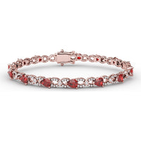 S-Curve Tennis Bracelet with Pear Shape Rubies and Halo Set Round Diamonds by Fana - 6.68 Carat Total Gemstone Weight