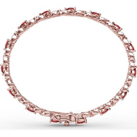 S-Curve Tennis Bracelet with Pear Shape Rubies and Halo Set Round Diamonds by Fana - 6.68 Carat Total Gemstone Weight