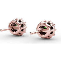 Shared-Prong Emerald and Diamond Halo Stud Earrings by Fana - 0.74 Carat Total Gemstone Weight