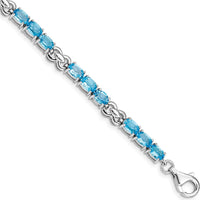 Sterling Silver Rhodium-Plated 7-Inch Bracelet with 18 Oval Swiss Blue Topaz Stones - 0.513 Carat Total Gem Weight by 0