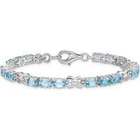 Sterling Silver Rhodium-Plated 7-Inch Bracelet with 18 Oval Swiss Blue Topaz Stones - 0.513 Carat Total Gem Weight by 0
