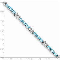 Sterling Silver Rhodium-Plated 7-Inch Bracelet with 18 Oval Swiss Blue Topaz Stones - 0.513 Carat Total Gem Weight by 0