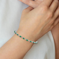 Sterling Silver Rhodium-Plated 7-Inch Bracelet with 19 Pear-Shaped Emeralds and 2 Round Diamonds - 0.18 Carat Emerald Weight, 0.01 Carat Total Diamond Weight by 0