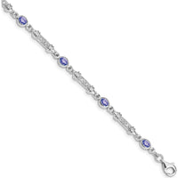 Sterling Silver Rhodium-Plated 7-Inch Tanzanite and Diamond Tennis Bracelet with Bezel Set Oval Tanzanite and Round Diamonds - 0.18 Carat Tanzanite, 0.07 Carat Total Diamond Weight by 0