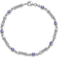 Sterling Silver Rhodium-Plated 7-Inch Tanzanite and Diamond Tennis Bracelet with Bezel Set Oval Tanzanite and Round Diamonds - 0.18 Carat Tanzanite, 0.07 Carat Total Diamond Weight by 0