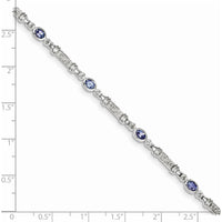 Sterling Silver Rhodium-Plated 7-Inch Tanzanite and Diamond Tennis Bracelet with Bezel Set Oval Tanzanite and Round Diamonds - 0.18 Carat Tanzanite, 0.07 Carat Total Diamond Weight by 0
