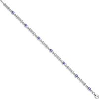 Sterling Silver Rhodium-Plated 7-Inch Tanzanite and Diamond Tennis Bracelet with Bezel Set Oval Tanzanite and Round Diamonds - 0.18 Carat Tanzanite, 0.07 Carat Total Diamond Weight by 0