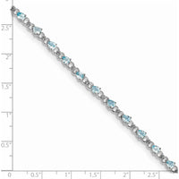 Sterling Silver Rhodium-Plated Aquamarine and Diamond Tennis Bracelet with 19 Pear-shaped Aquamarine Stones and 2 Round Diamonds - 0.13 Carat Total Gem Weight by 0