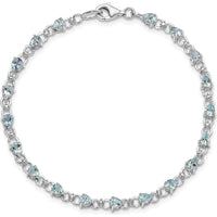 Sterling Silver Rhodium-Plated Aquamarine and Diamond Tennis Bracelet with 19 Pear-shaped Aquamarine Stones and 2 Round Diamonds - 0.13 Carat Total Gem Weight by 0