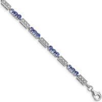 Sterling Silver Rhodium-Plated Tanzanite and Diamond Bracelet with 27 Round Tanzanite Stones and 2 Round Diamonds - 0.12 Carat Total Gem Weight by 0