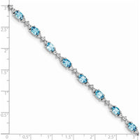 Sterling Silver Rhodium-Plated Tennis Bracelet with Oval Swiss Blue Topaz & Round White Topaz - 0.61 Carat Total Gem Weight by Monteluci Fine Jewelry
