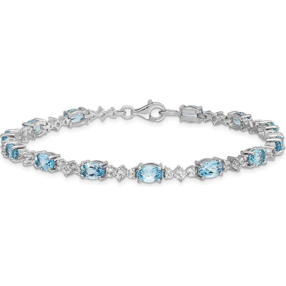 Sterling Silver Rhodium-Plated Tennis Bracelet with Oval Swiss Blue Topaz & Round White Topaz - 0.61 Carat Total Gem Weight by Monteluci Fine Jewelry
