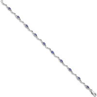 Sterling Silver Rhodium Plated Tennis Bracelet with Oval Tanzanite and Diamond Accents - 1.77 Carat Total Gem Weight by 0