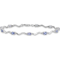 Sterling Silver Rhodium Plated Tennis Bracelet with Oval Tanzanite and Diamond Accents - 1.77 Carat Total Gem Weight by 0