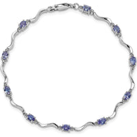 Sterling Silver Rhodium Plated Tennis Bracelet with Oval Tanzanite and Diamond Accents - 1.77 Carat Total Gem Weight by 0
