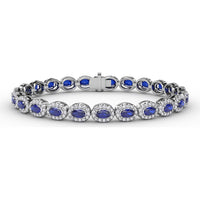 Tennis Bracelet with Halo Set Oval Sapphires and Round Diamonds by Fana - 10.34 Carat Total Gemstone Weight