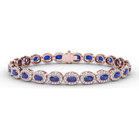 Tennis Bracelet with Halo Set Oval Sapphires and Round Diamonds by Fana - 10.34 Carat Total Gemstone Weight