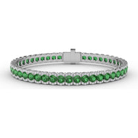 Tennis Bracelet with Halo Set Round Emeralds and Pavé Diamonds by Fana - 9.45 Carat Total Gemstone Weight
