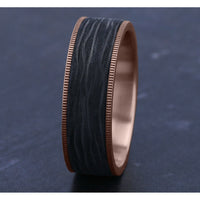 The Cinder Men's Wedding Band in 14K Rose Gold and Forged Carbon Fiber - 7.5mm Width by Ammara Stone