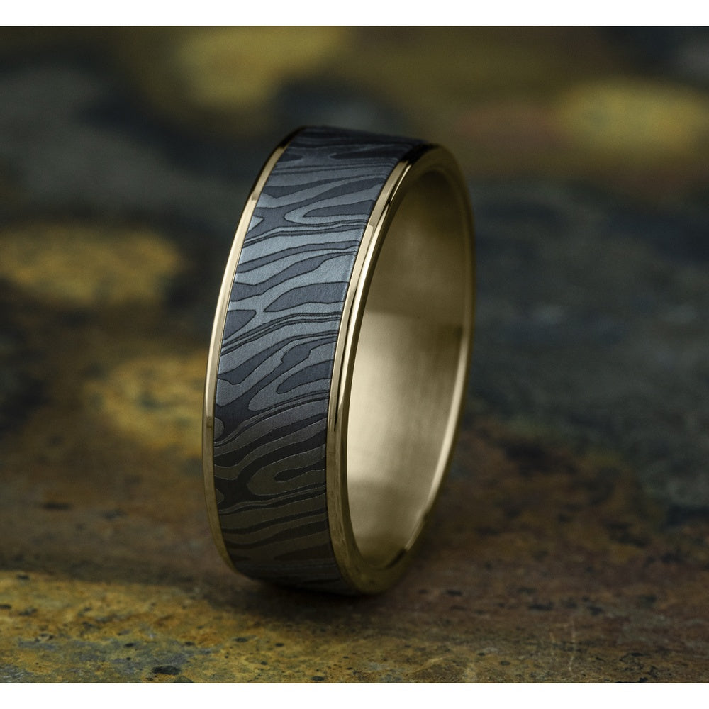 The Tiger Stripe Men's Wedding Band in 14K Yellow Gold and Grey Tantalum - 7.5mm Width by Ammara Stone