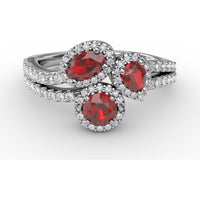 Three-Stone Halo Ring with Round Rubies and Pavé Diamonds by Fana - 1.30 Carat Total Gemstone Weight