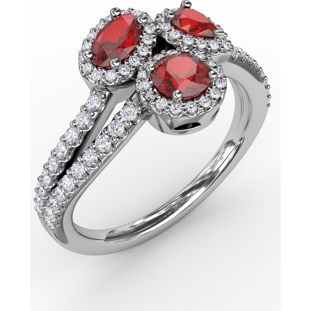 Three-Stone Halo Ring with Round Rubies and Pavé Diamonds by Fana - 1.30 Carat Total Gemstone Weight
