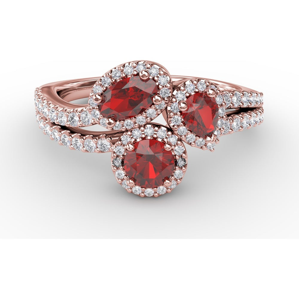 Three-Stone Halo Ring with Round Rubies and Pavé Diamonds by Fana - 1.30 Carat Total Gemstone Weight