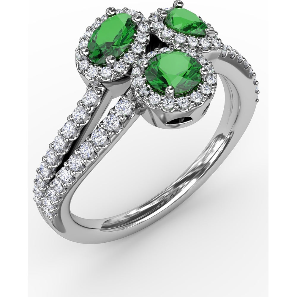 Three-Stone Oval Emerald Ring with Diamond Halos and Split Shank by Fana - 1.06 Carat Total Gemstone Weight