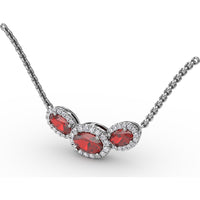 Three Stone Oval Ruby Pendant with Diamond Halo by Fana - 1.57 Carat Total Gemstone Weight