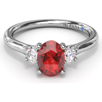 Three Stone Ring with Oval Ruby and Diamond Side Stones by Fana - 1.31 Carat Total Gemstone Weight