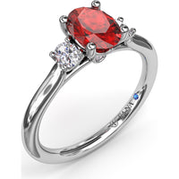 Three Stone Ring with Oval Ruby and Diamond Side Stones by Fana - 1.31 Carat Total Gemstone Weight