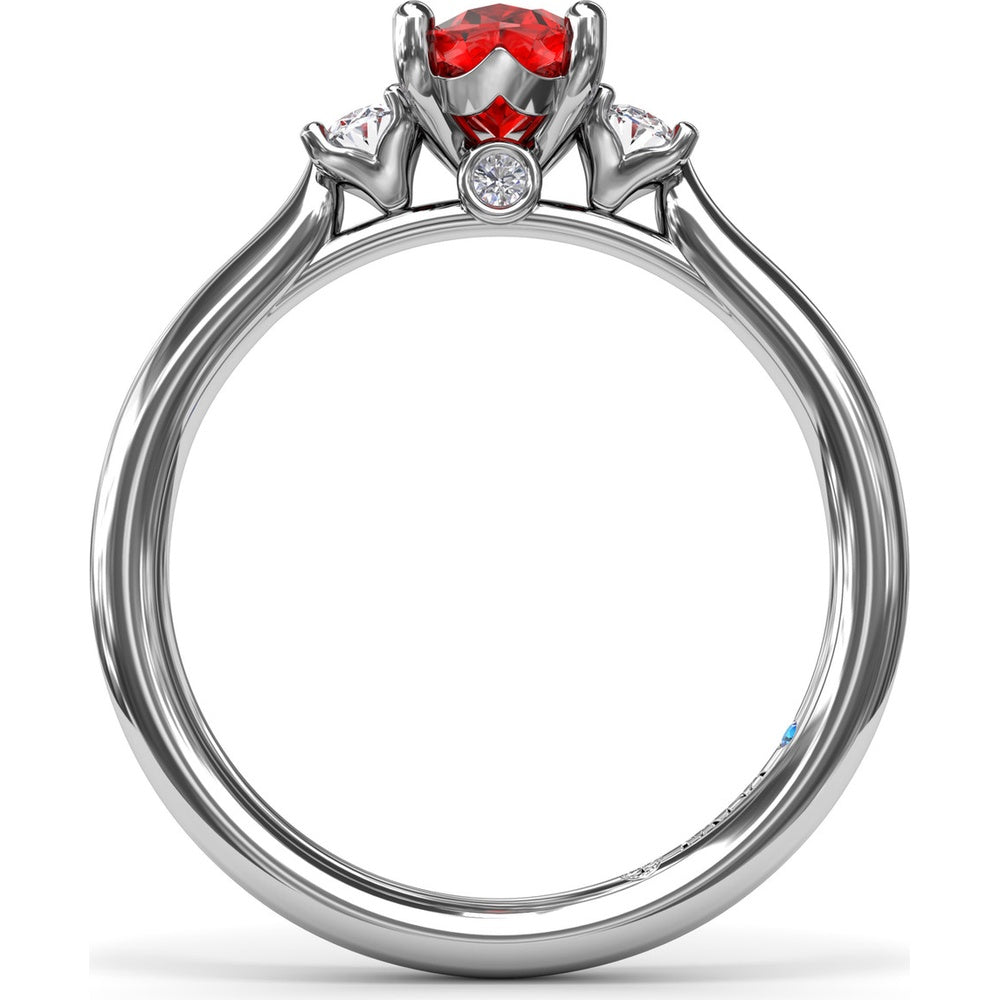Three Stone Ring with Oval Ruby and Diamond Side Stones by Fana - 1.31 Carat Total Gemstone Weight