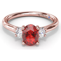 Three Stone Ring with Oval Ruby and Diamond Side Stones by Fana - 1.31 Carat Total Gemstone Weight