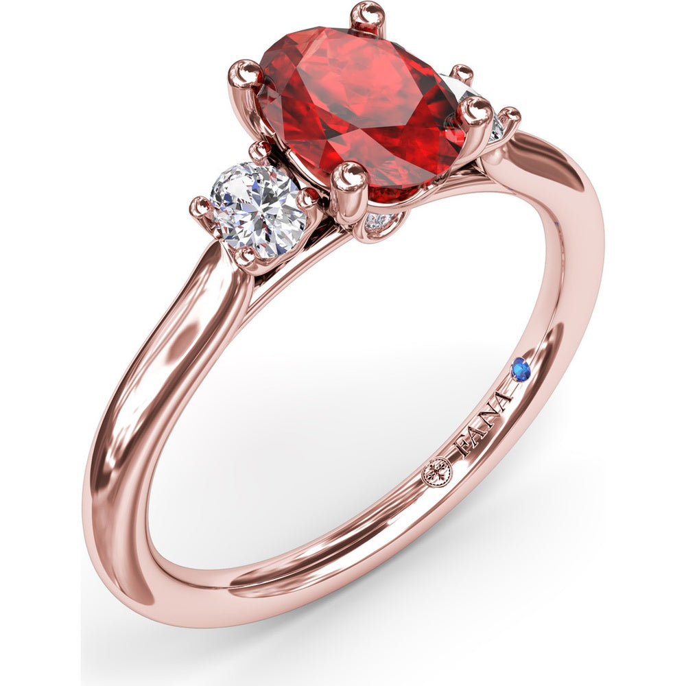 Three Stone Ring with Oval Ruby and Diamond Side Stones by Fana - 1.31 Carat Total Gemstone Weight