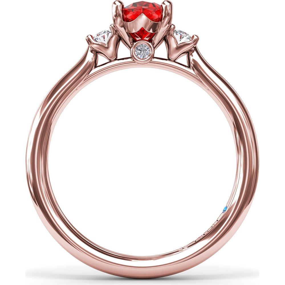 Three Stone Ring with Oval Ruby and Diamond Side Stones by Fana - 1.31 Carat Total Gemstone Weight