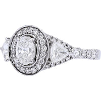 Timeless Elegance 14K White Gold Oval Halo Engagement Ring with 1.50 Carats of Diamonds