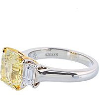 3 Carat Radiant Cut Diamond Fancy Intense Yellow GIA With Two Side Trapezoids Three Stone Ring