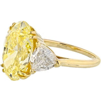 6.95 Carat Oval Cut Fancy Intense Yellow Three Stone Diamond Engagement Ring