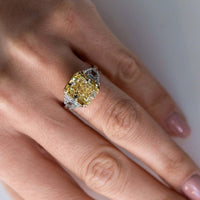 7.05 Carat Radiant Cut Fancy Yellow VS2 Clarity Three Stone Engagement Ring